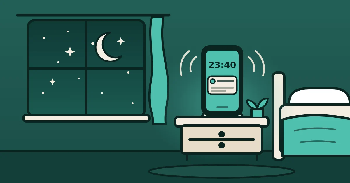 Night, a phone on the bedside table, a notification at 23:40 on the screen